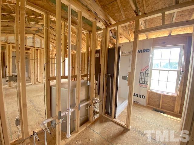 151 Mamie Road Benson, NC 27504 - Photo 11 of 33 a view of a bathroom with a tub and shower