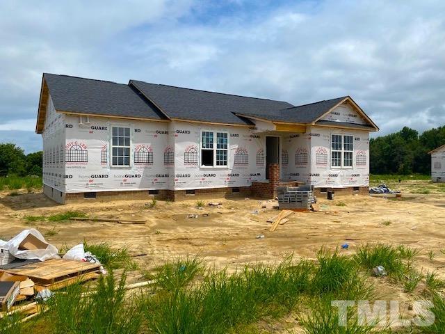 151 Mamie Road Benson, NC 27504 - Photo 4 of 33 a view of a house with swimming pool