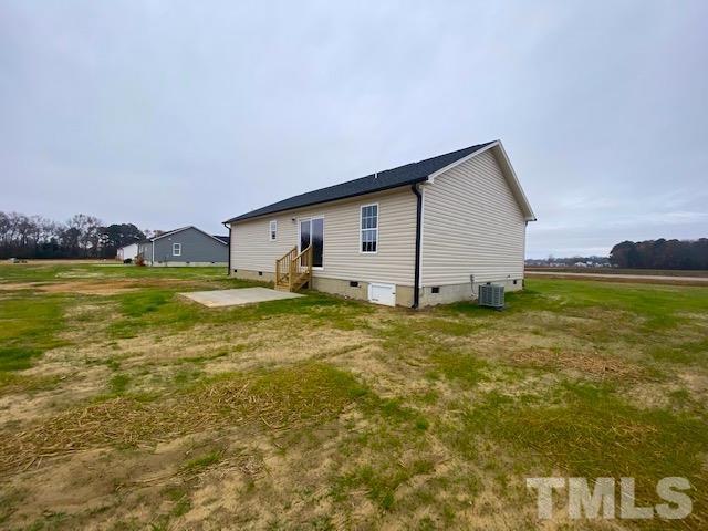151 Mamie Road Benson, NC 27504 - Photo 32 of 33 a view of a house with a big yard