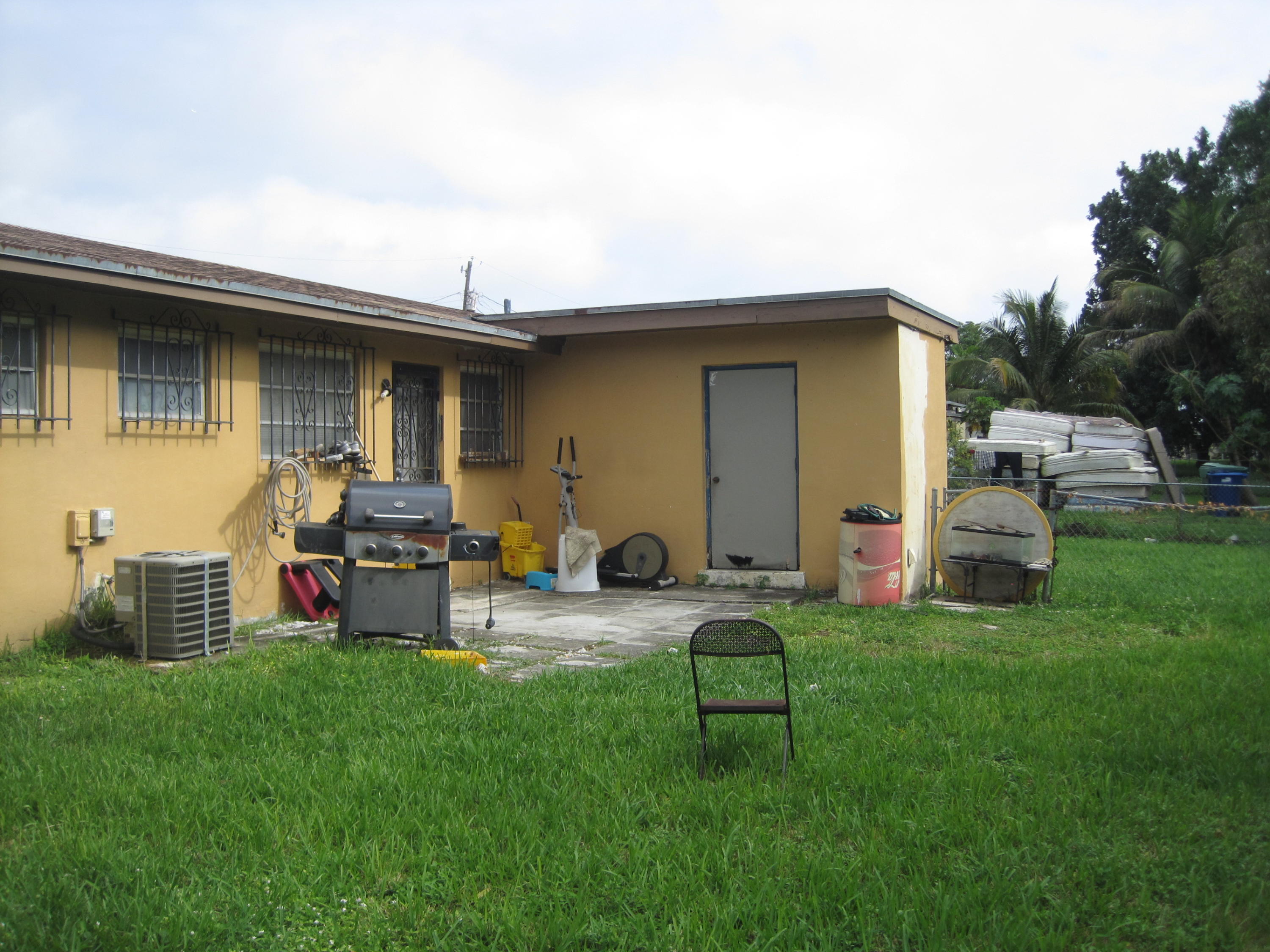 1650 Northeast 147th Street North Miami Beach, FL 33181 - Photo 22 of 35 Unit 1 & 2 Rear View