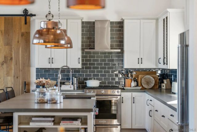 a view of a swimming pool with an outdoor seating yard and mountain view