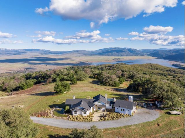 a view of a city with mountains in the background