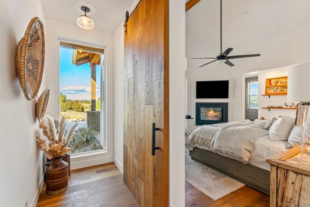 a open kitchen with stainless steel appliances granite countertop a stove and a refrigerator