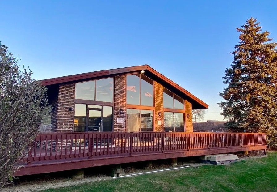 840 Elder Road, Unit A116 Homewood, IL 60430 - Photo 4 of 14 a view of a house with a wooden deck and a yard