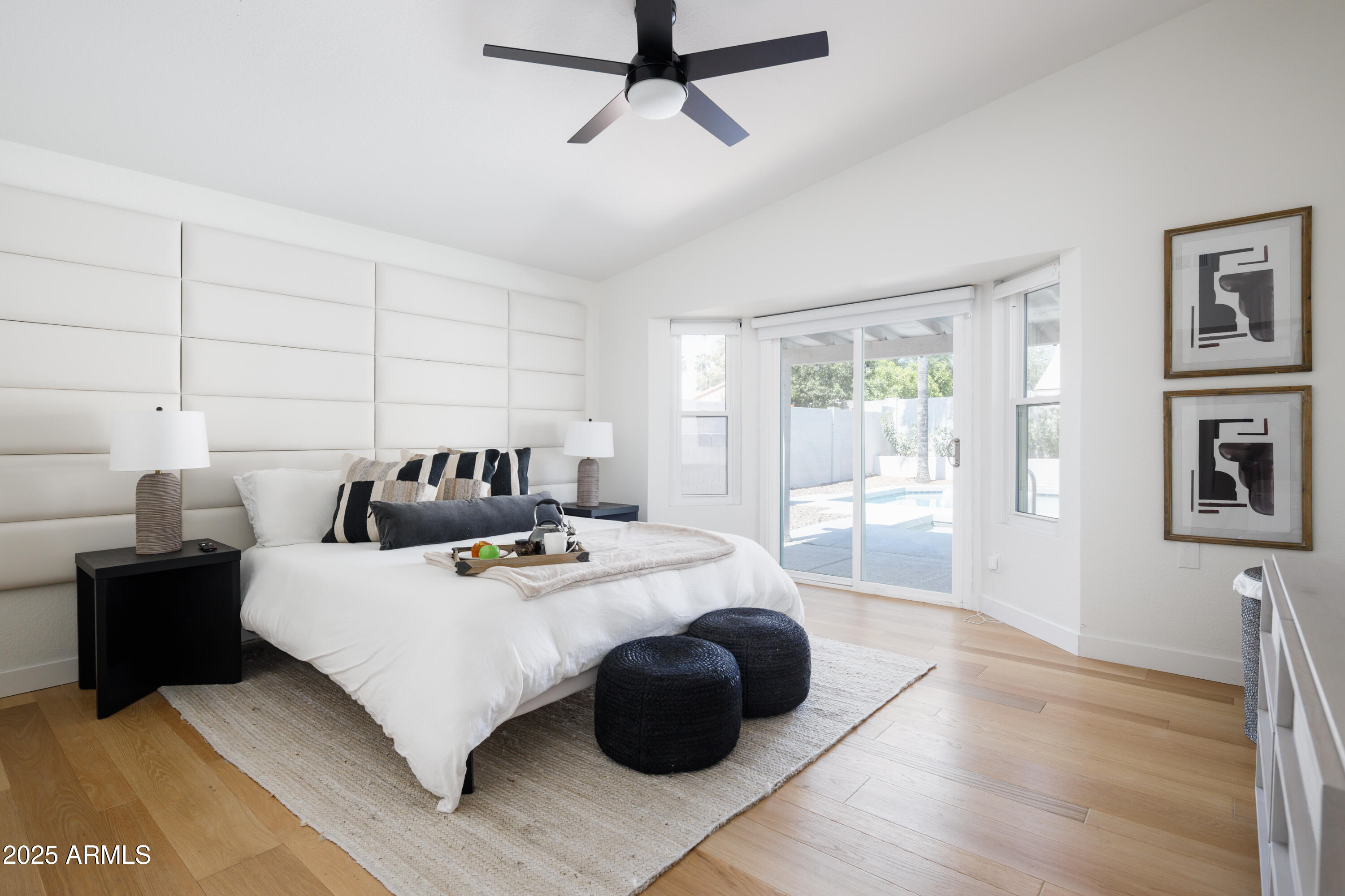 5502 East Grandview Road Scottsdale, AZ 85254 - Photo 21 of 42 a bed room with a bed and a couch