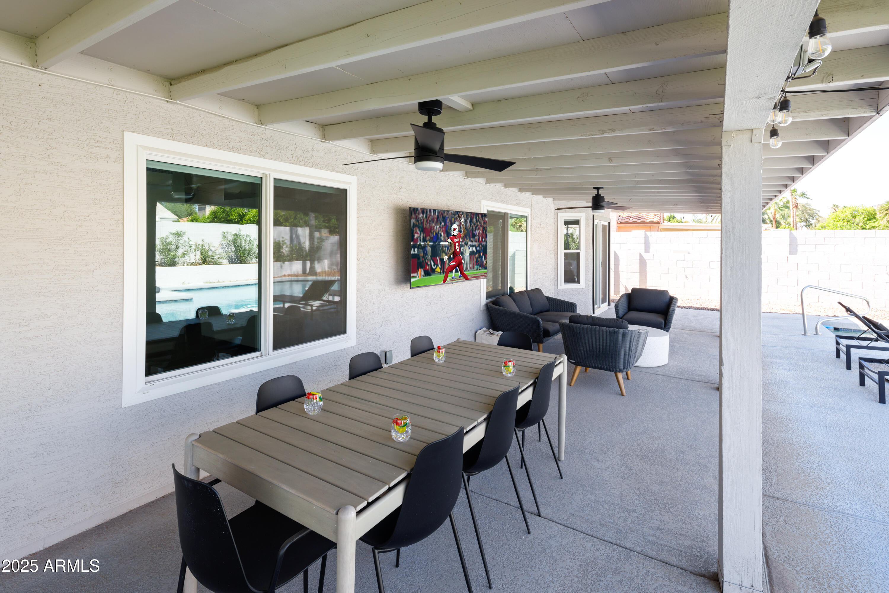 5502 East Grandview Road Scottsdale, AZ 85254 - Photo 33 of 42 a view of a dining room with furniture window and outside view