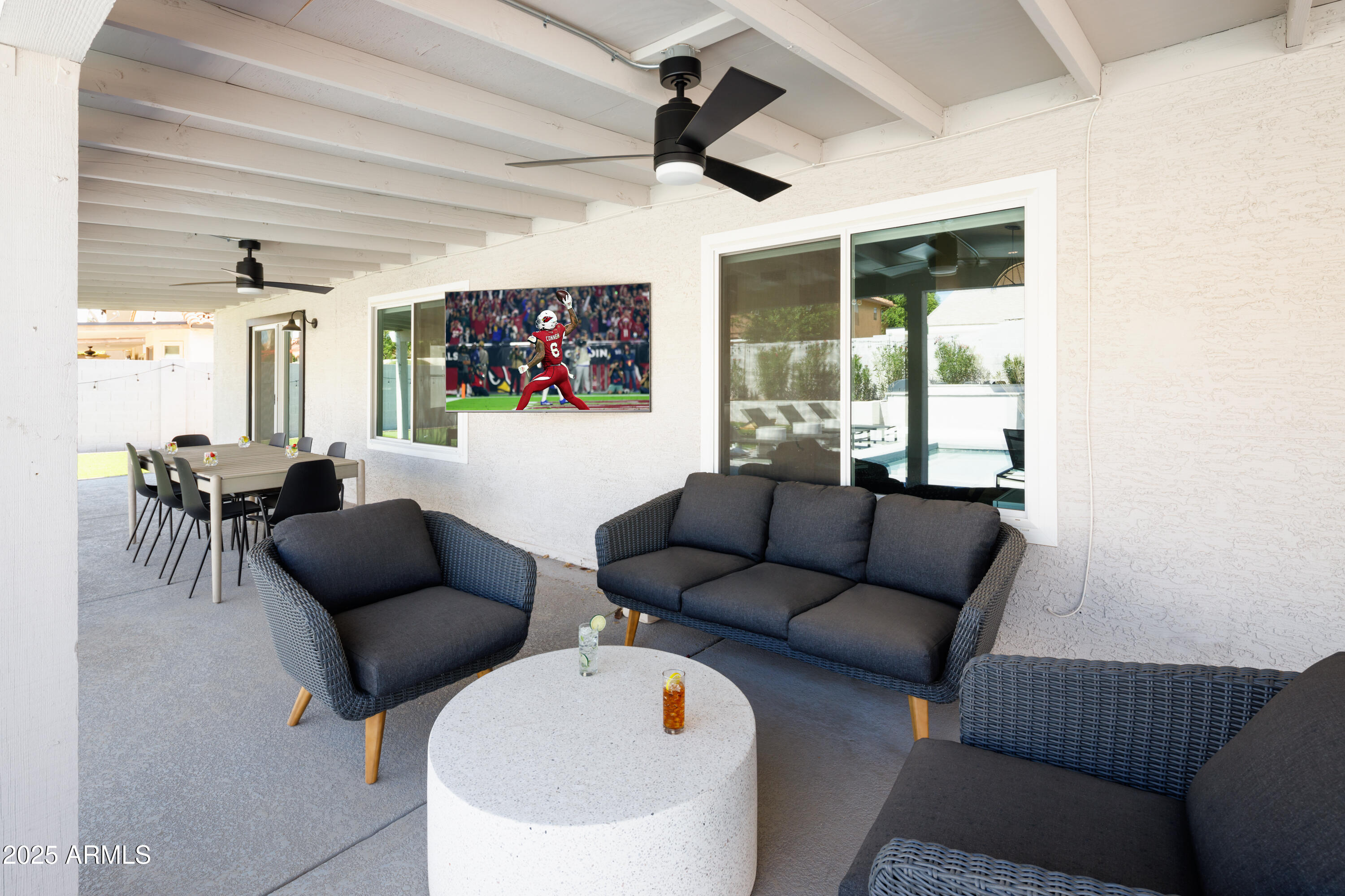 5502 East Grandview Road Scottsdale, AZ 85254 - Photo 34 of 42 a living room with furniture and a large window