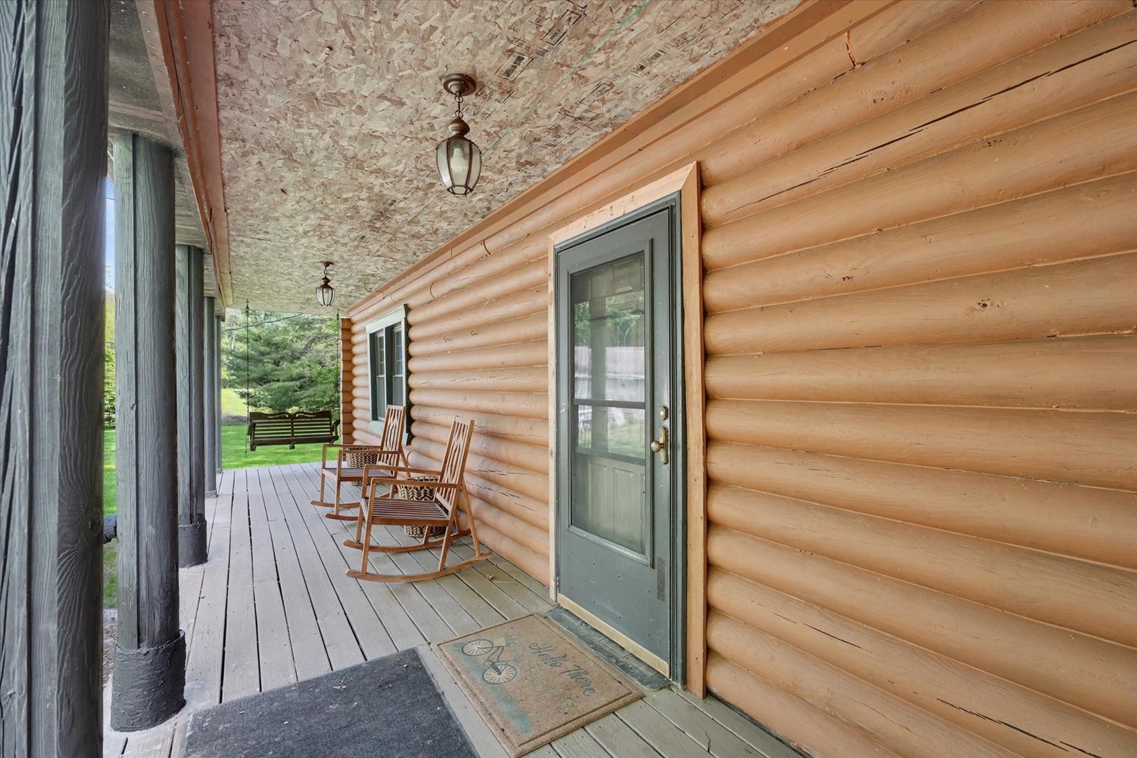 2431 North 1450 East Road Mansfield, IL 61854 - Photo 40 of 78 a balcony with chairs and with potted plants