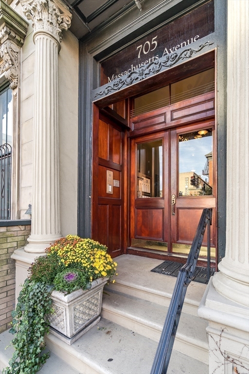 705 Massachusetts Avenue, Unit 6 Boston, MA 02118 - Photo 13 of 14 a front view of a house with a porch