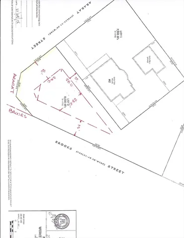 a view of a tree with a yard