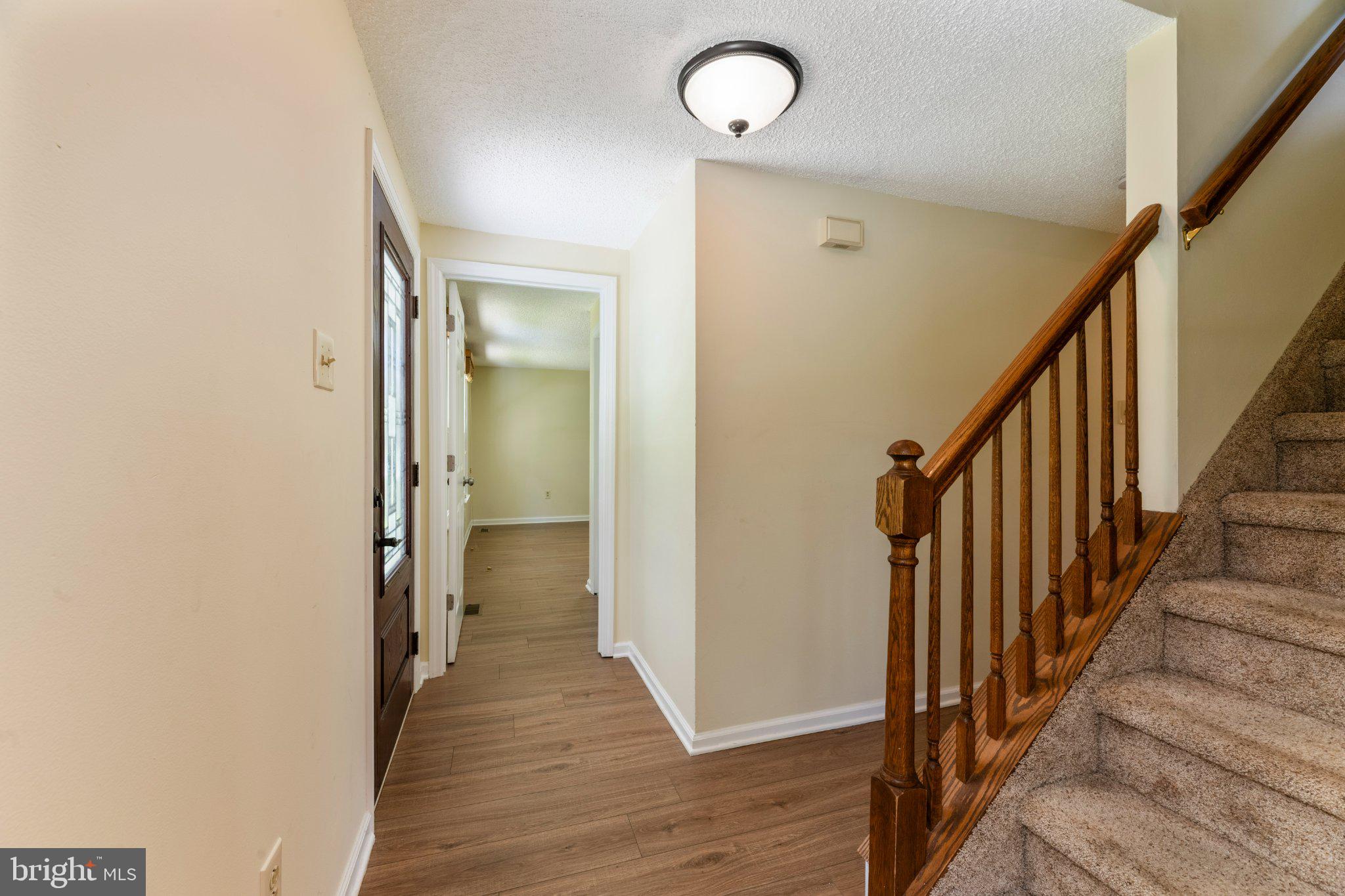 607 Chesterfield Arneytown Road Chesterfield, NJ 08515 - Photo 6 of 57 Welcoming entryway with warm tones.