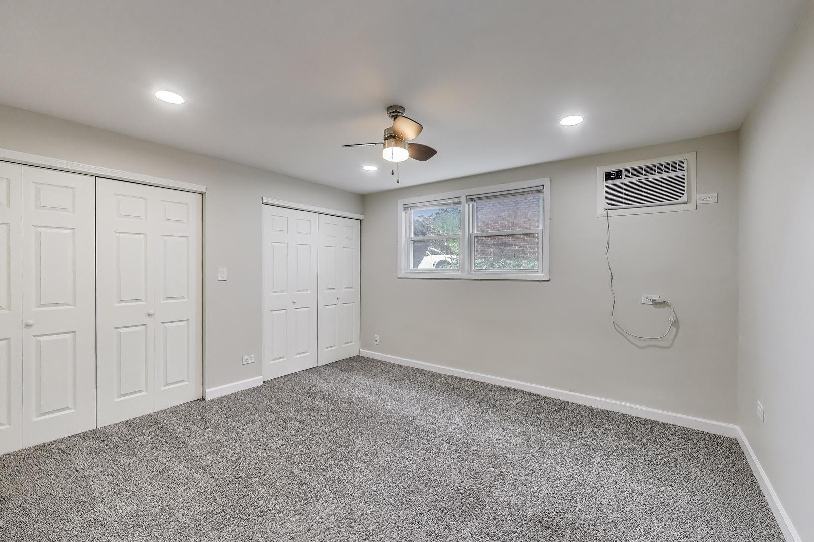 1086 North Northwest Highway, Unit G Park Ridge, IL 60068 - Photo 8 of 13 a view of an empty room with a window