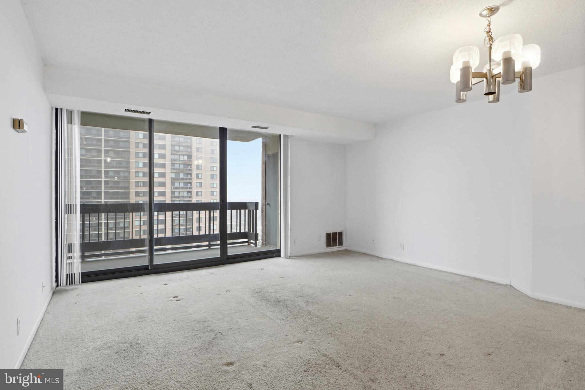 5505 Seminary Road, Unit 917N Falls Church, VA 22041 - Photo 7 of 17 Living room with floor to ceiling windows