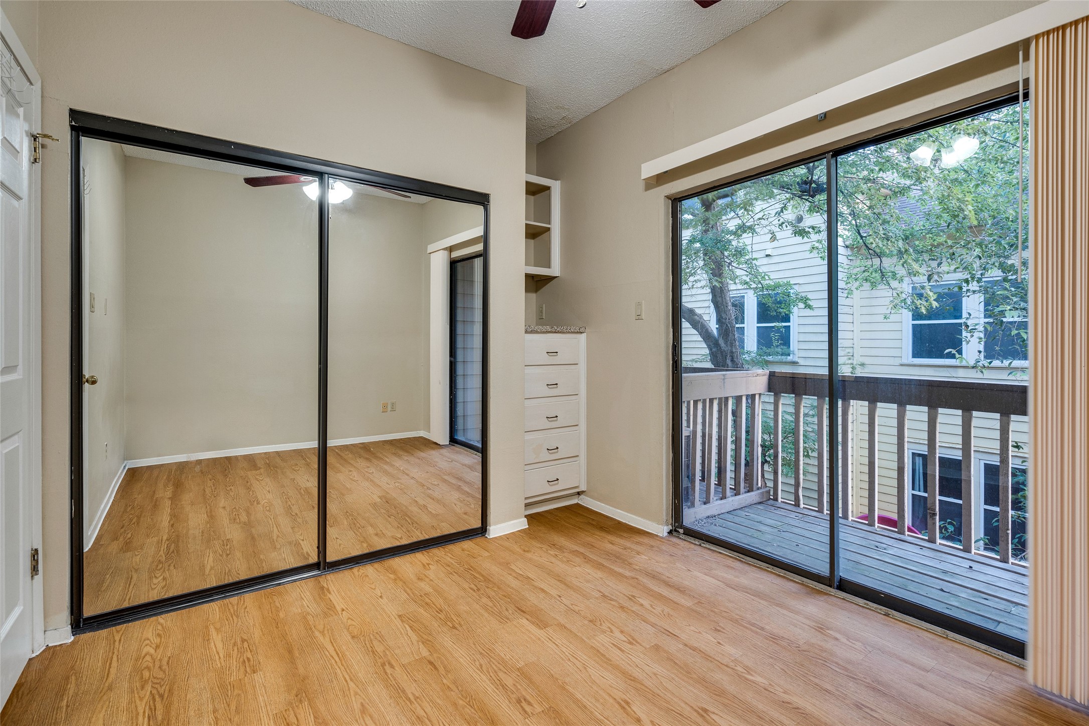 2210 Pearl Street, Unit 203 Austin, TX 78705 - Photo 19 of 22 a view of livingroom with wooden floor