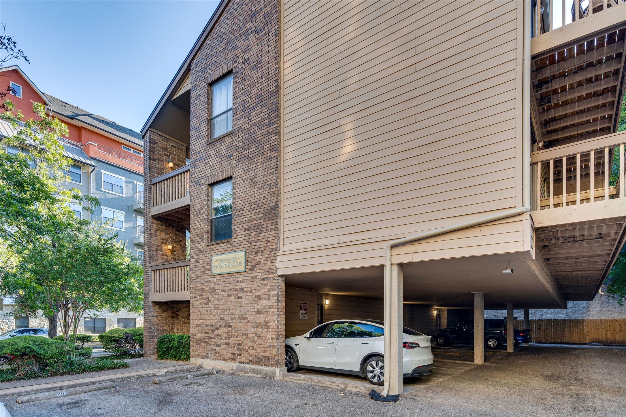 2210 Pearl Street, Unit 203 Austin, TX 78705 - Photo 2 of 22 a view of a building with sitting area