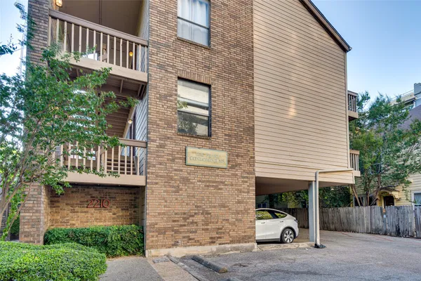 a car parked in front of a house