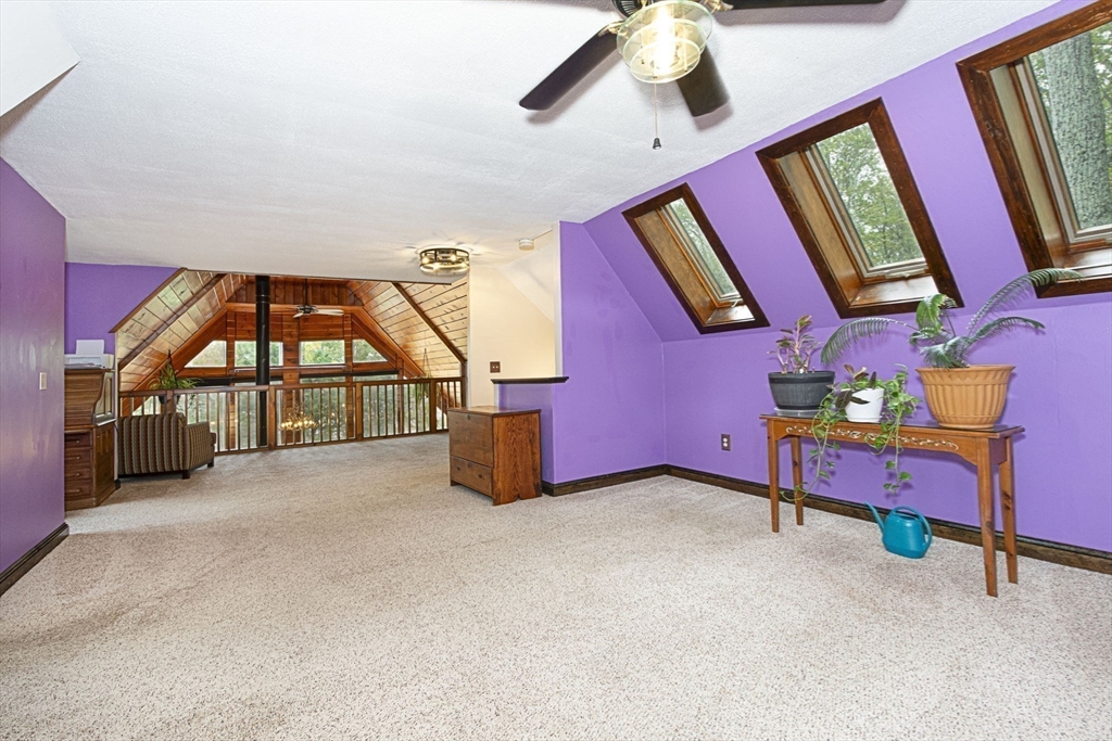 17 West Shore Drive Ashburnham, MA 01430 - Photo 19 of 42 a view of an empty room with windows