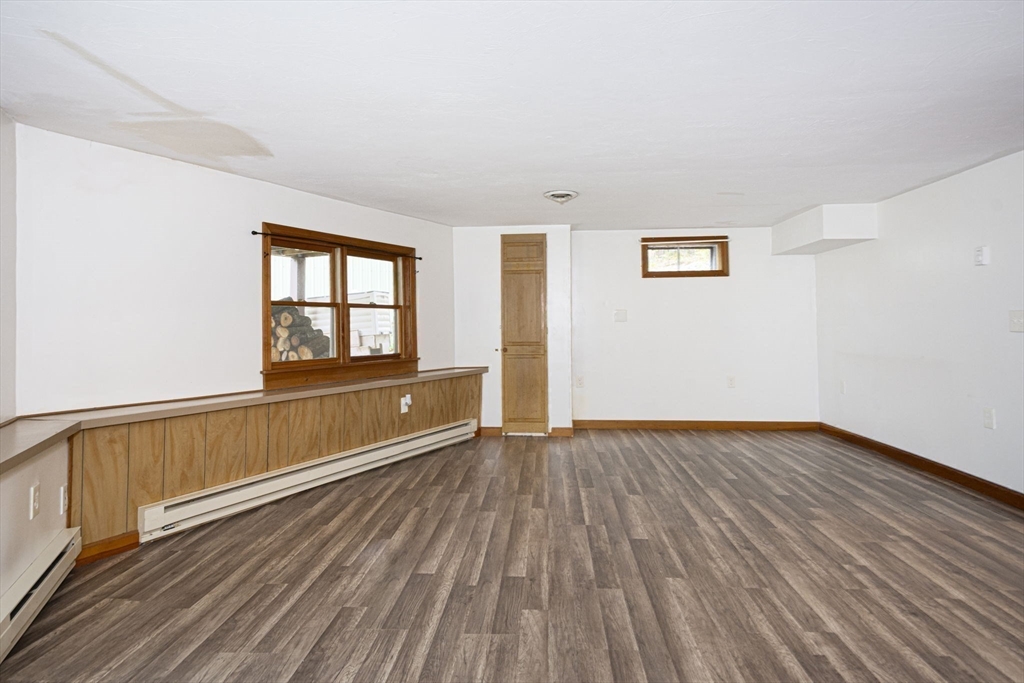 17 West Shore Drive Ashburnham, MA 01430 - Photo 25 of 42 wooden floor in an empty room with a window