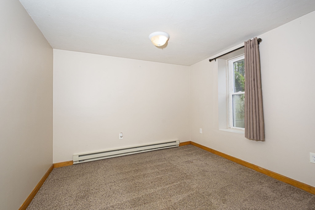 17 West Shore Drive Ashburnham, MA 01430 - Photo 26 of 42 an empty room with a window
