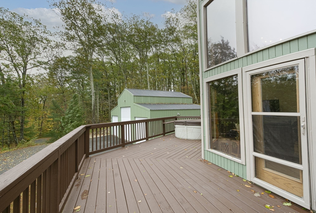 17 West Shore Drive Ashburnham, MA 01430 - Photo 33 of 42 a view of a balcony with wooden floor and fence