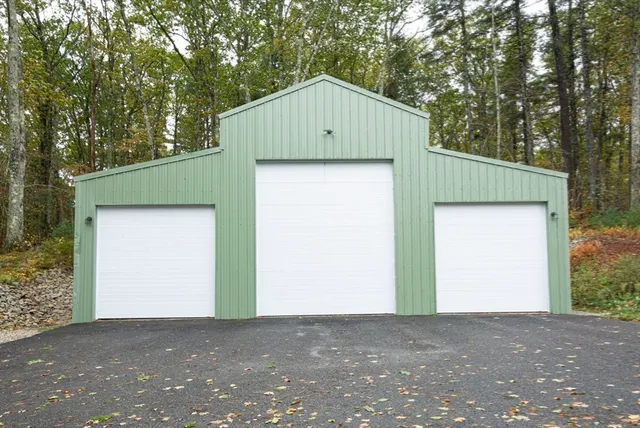 a house with trees in the background