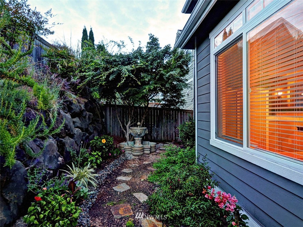 906 North 27th Place Renton, WA 98056 - Photo 23 of 25 a garden view with a seating space