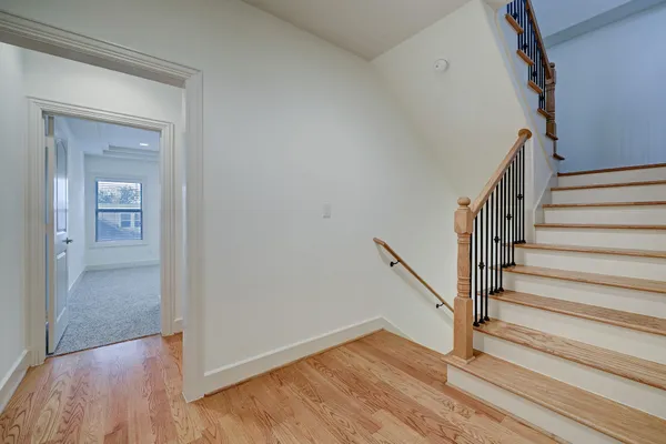 a view of entryway with wooden floor