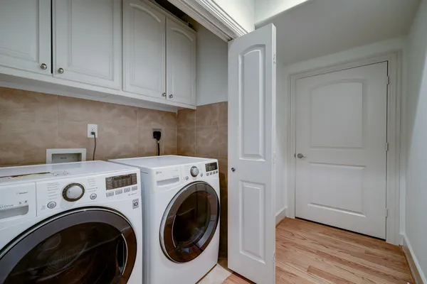 a view of livingroom with washer and dryer