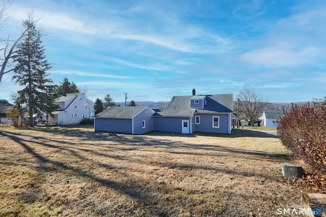 a view of big house with a big yard