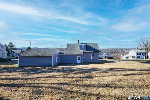 a view of a houses with a big yard