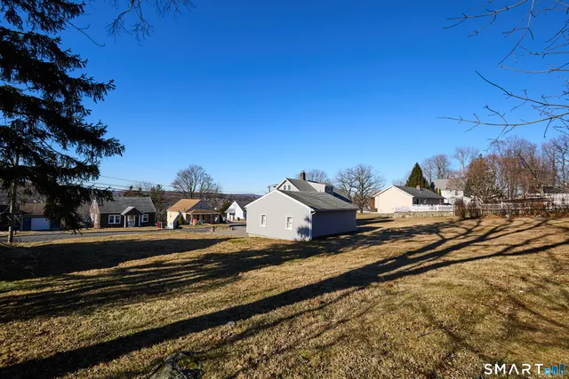a view of a train that is sitting on the tracks