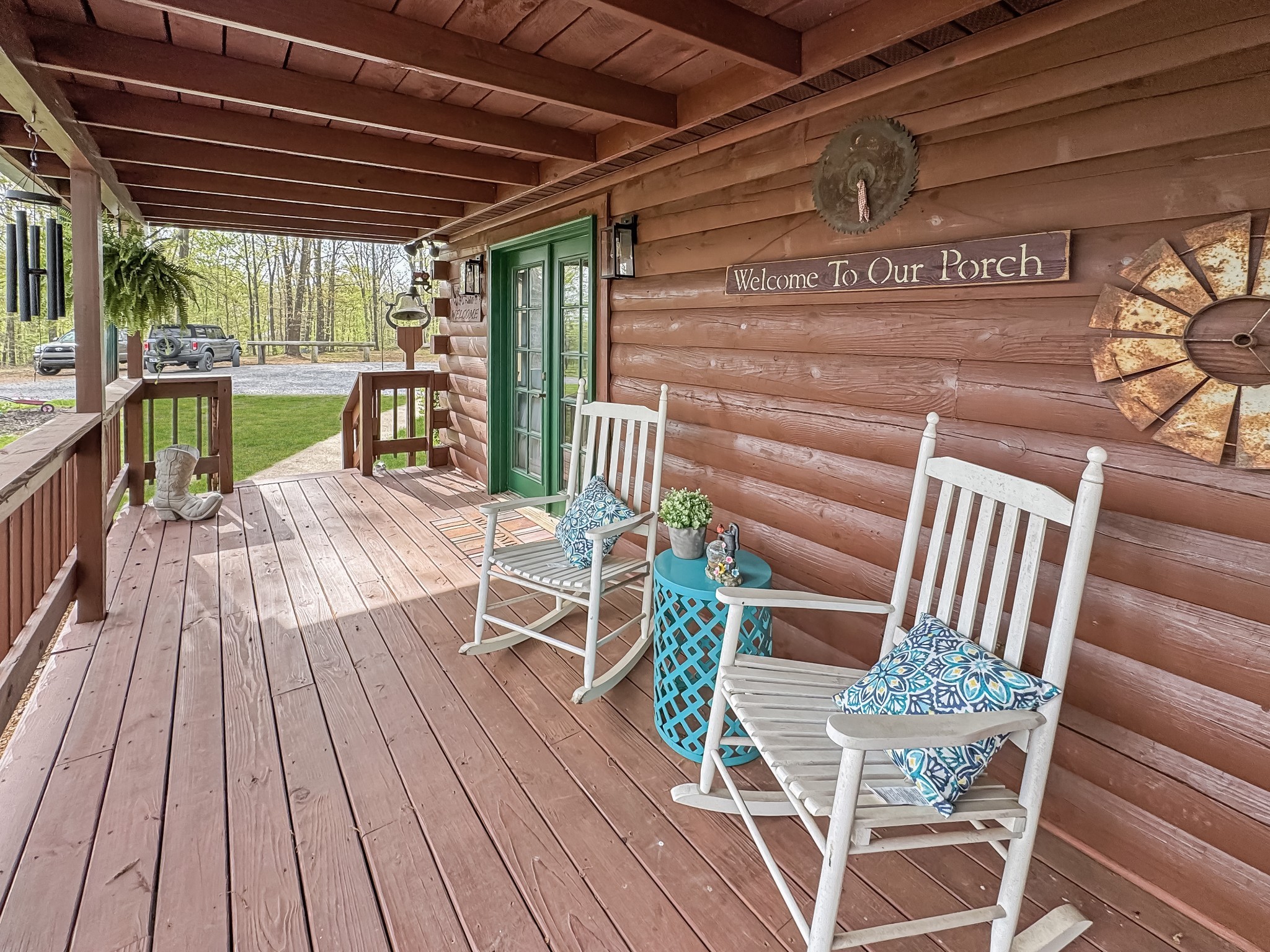 130 Wayne Threatt Road Dover, TN 37058 - Photo 2 of 28 a view of a chairs and table on the deck
