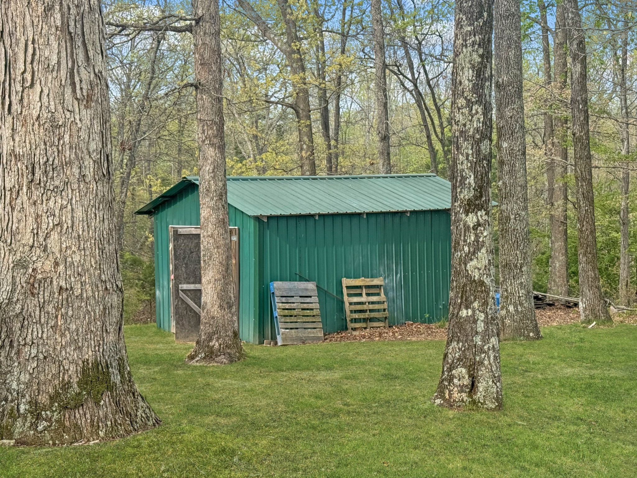 130 Wayne Threatt Road Dover, TN 37058 - Photo 26 of 28 front view of a house with a yard