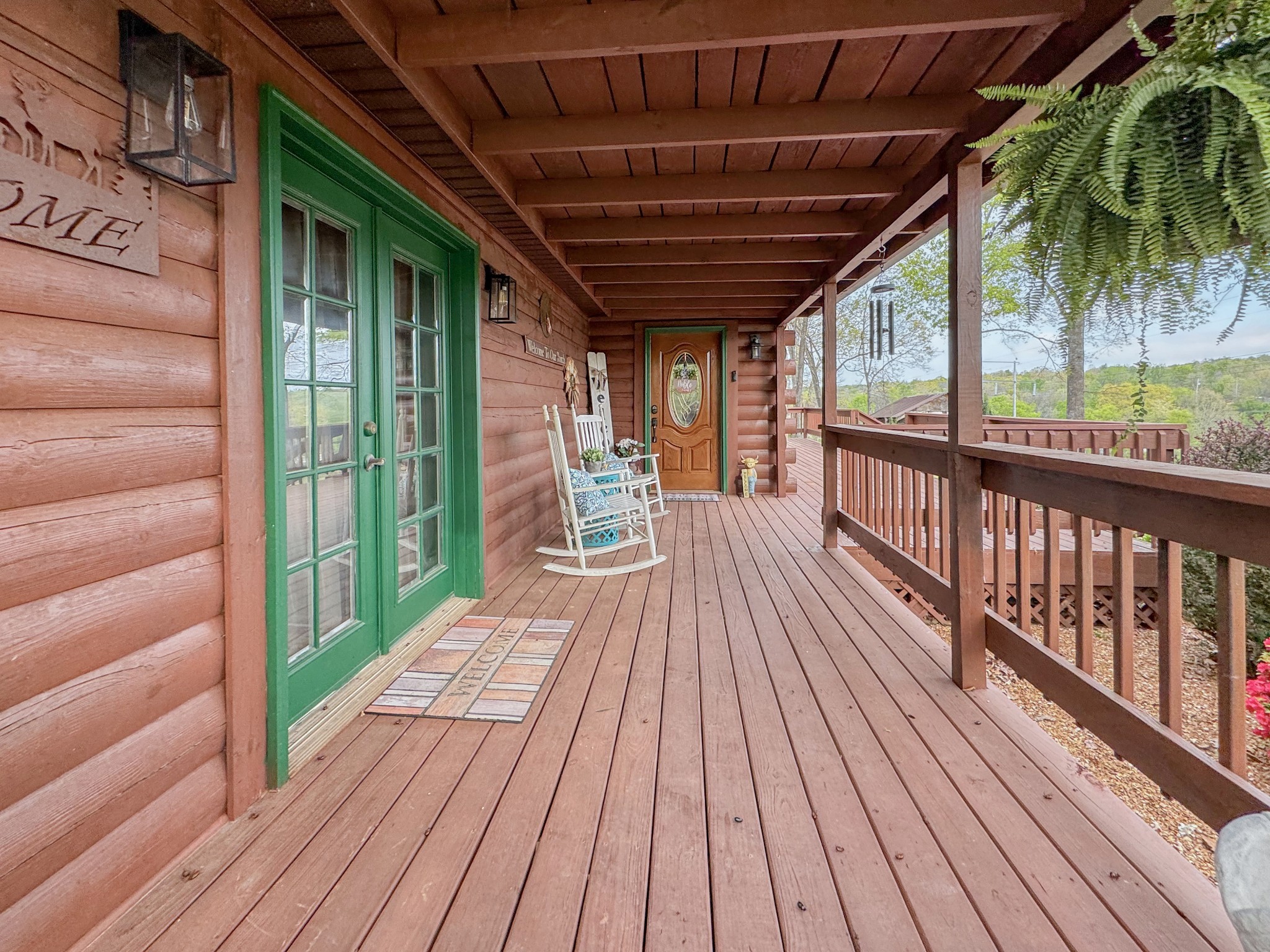 130 Wayne Threatt Road Dover, TN 37058 - Photo 3 of 28 a view of balcony with wooden floor