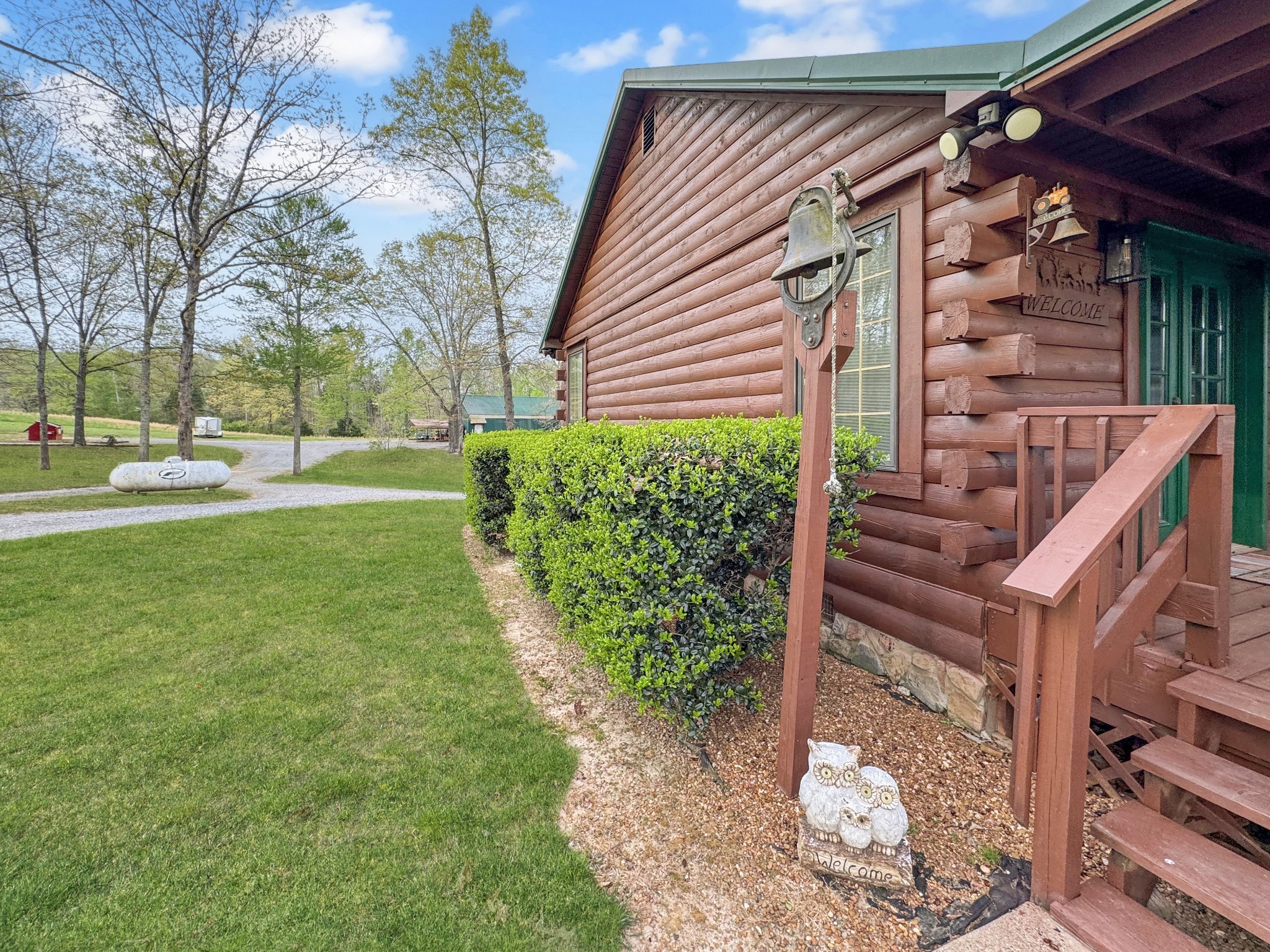 130 Wayne Threatt Road Dover, TN 37058 - Photo 4 of 28 a backyard of a house with lots of green space