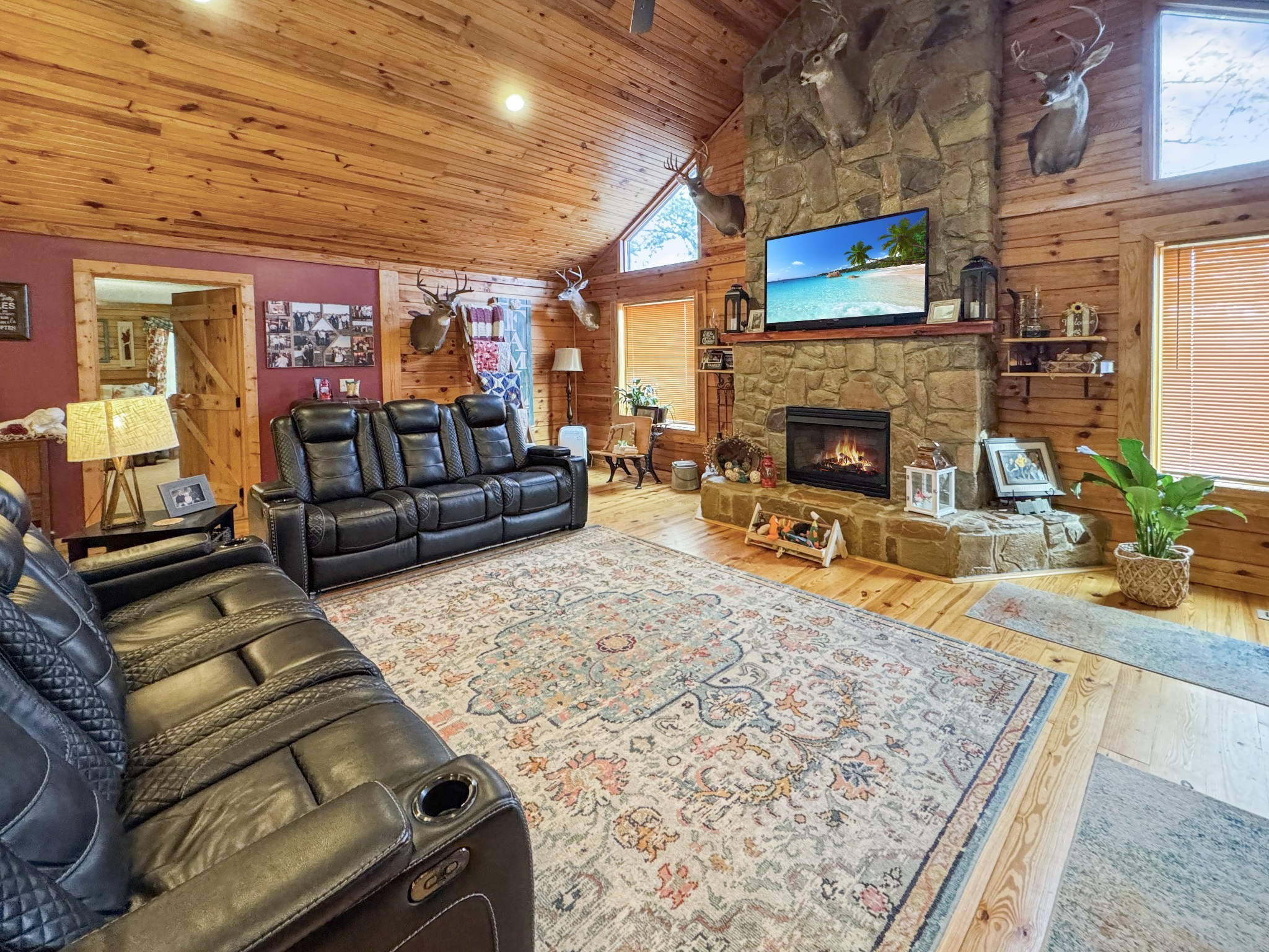 130 Wayne Threatt Road Dover, TN 37058 - Photo 8 of 28 a living room with furniture and a fireplace