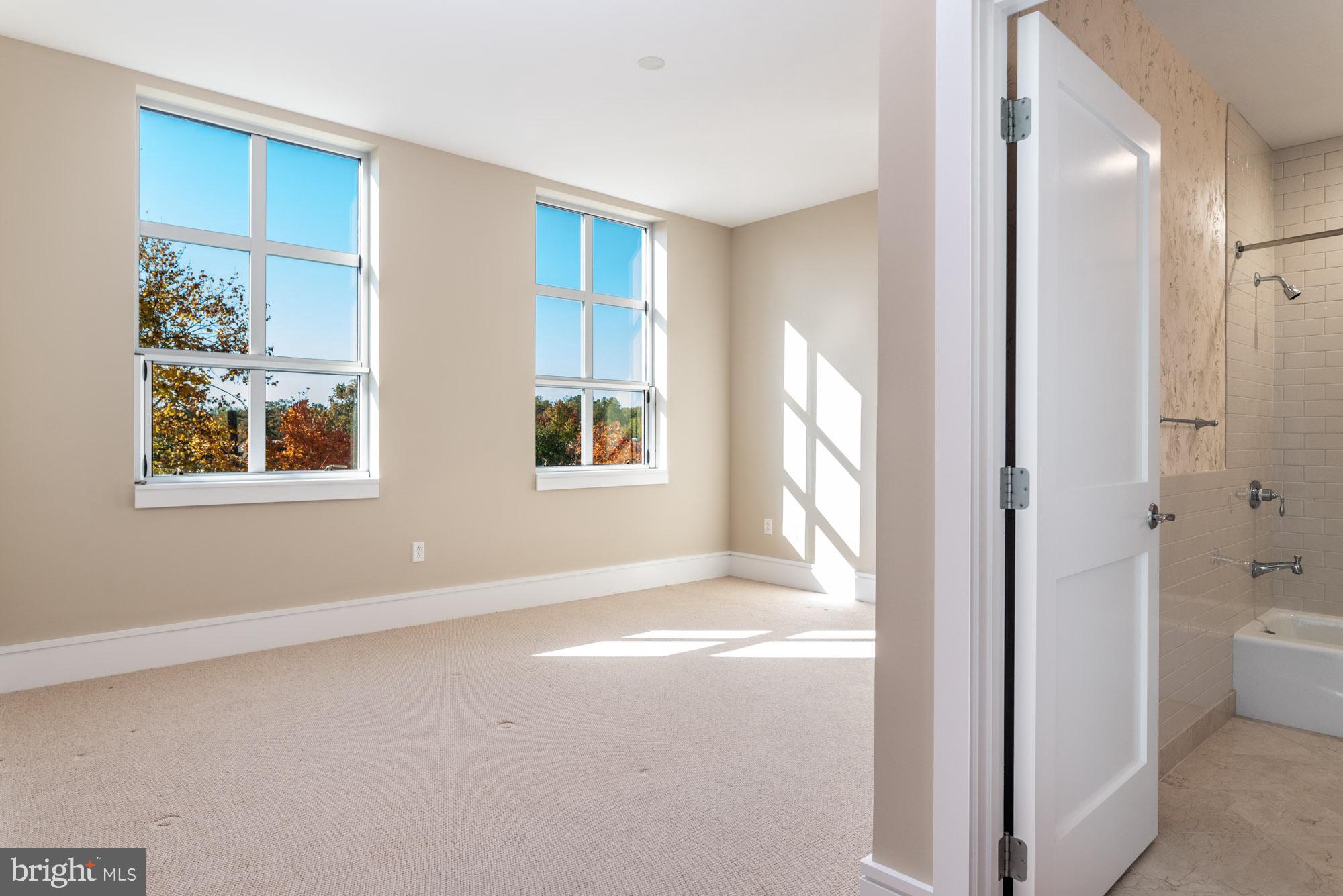 223 Iron Works Way Wayne, PA 19087 - Photo 15 of 23 a view of an empty room with a window