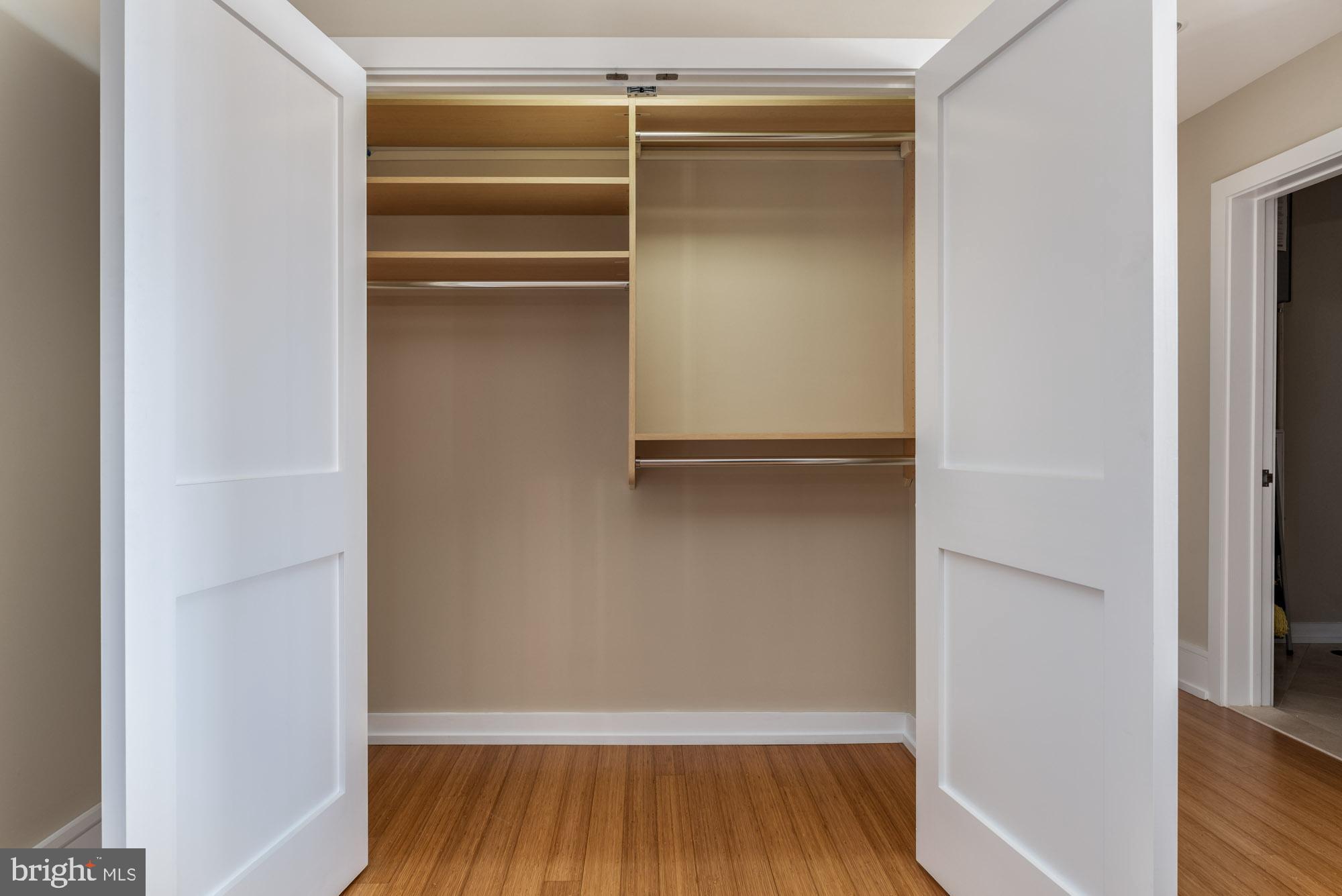223 Iron Works Way Wayne, PA 19087 - Photo 19 of 23 a view of walk in closet with wooden floor
