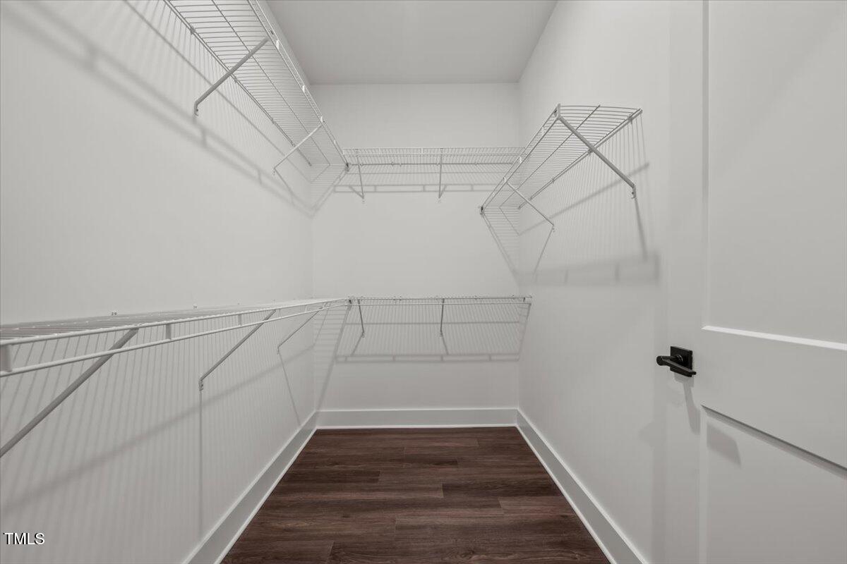 130 Old Heritage Road Randleman, NC 27317 - Photo 15 of 24 a view of a room with racks on the wall