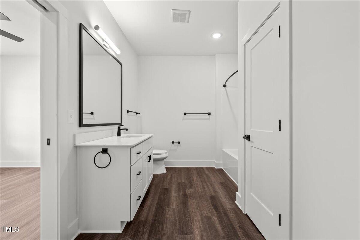 130 Old Heritage Road Randleman, NC 27317 - Photo 18 of 24 a bathroom with a sink and a mirror