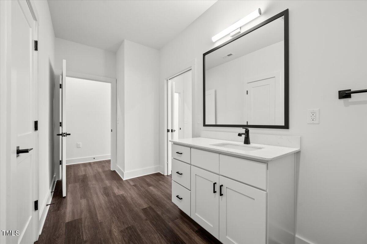 130 Old Heritage Road Randleman, NC 27317 - Photo 19 of 24 a view of bathroom with a sink mirror and window