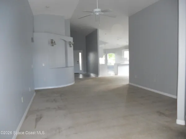 an empty room that has a window