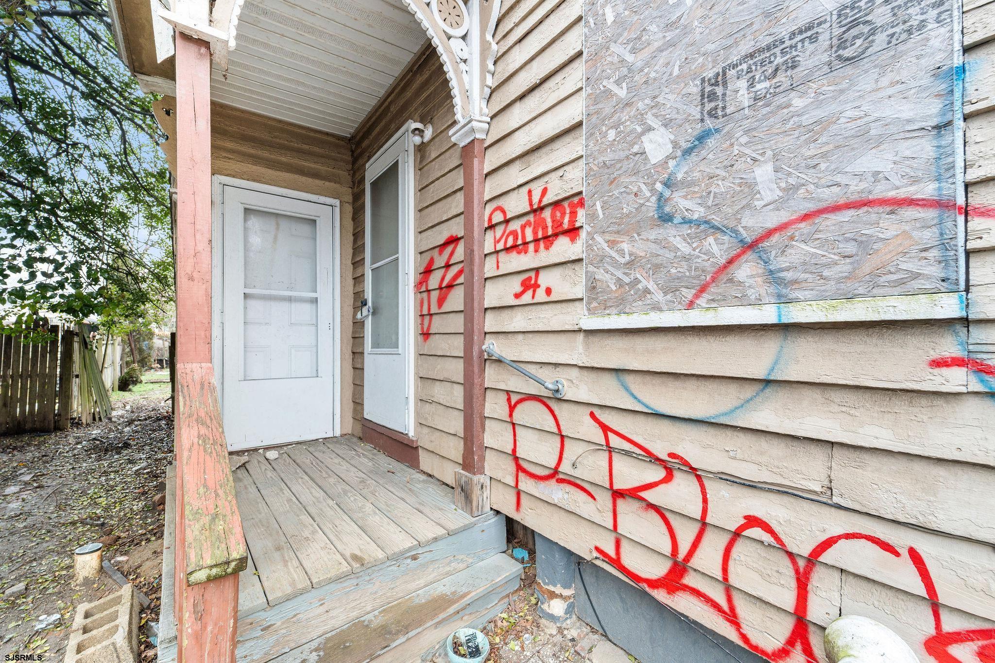 39 Cedar Street Bridgeton, NJ 08302 - Photo 19 of 19 a sign that is on the wall of a building