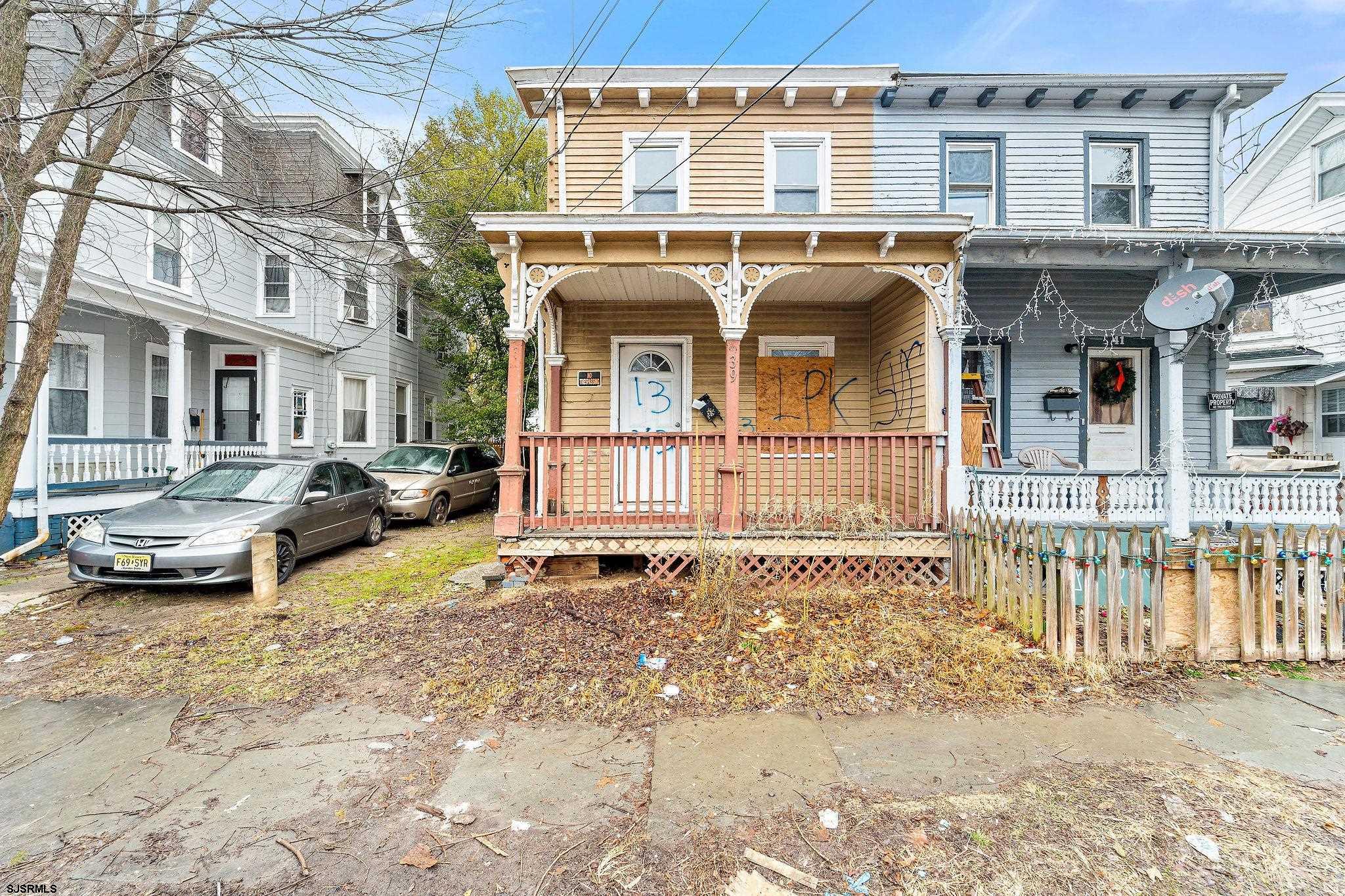 39 Cedar Street Bridgeton, NJ 08302 - Photo 2 of 19 a view of a car park in front of a building