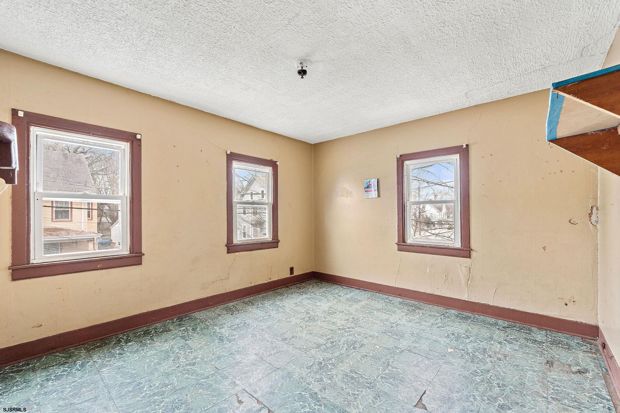 39 Cedar Street Bridgeton, NJ 08302 - Photo 9 of 19 a view of an empty room with a window