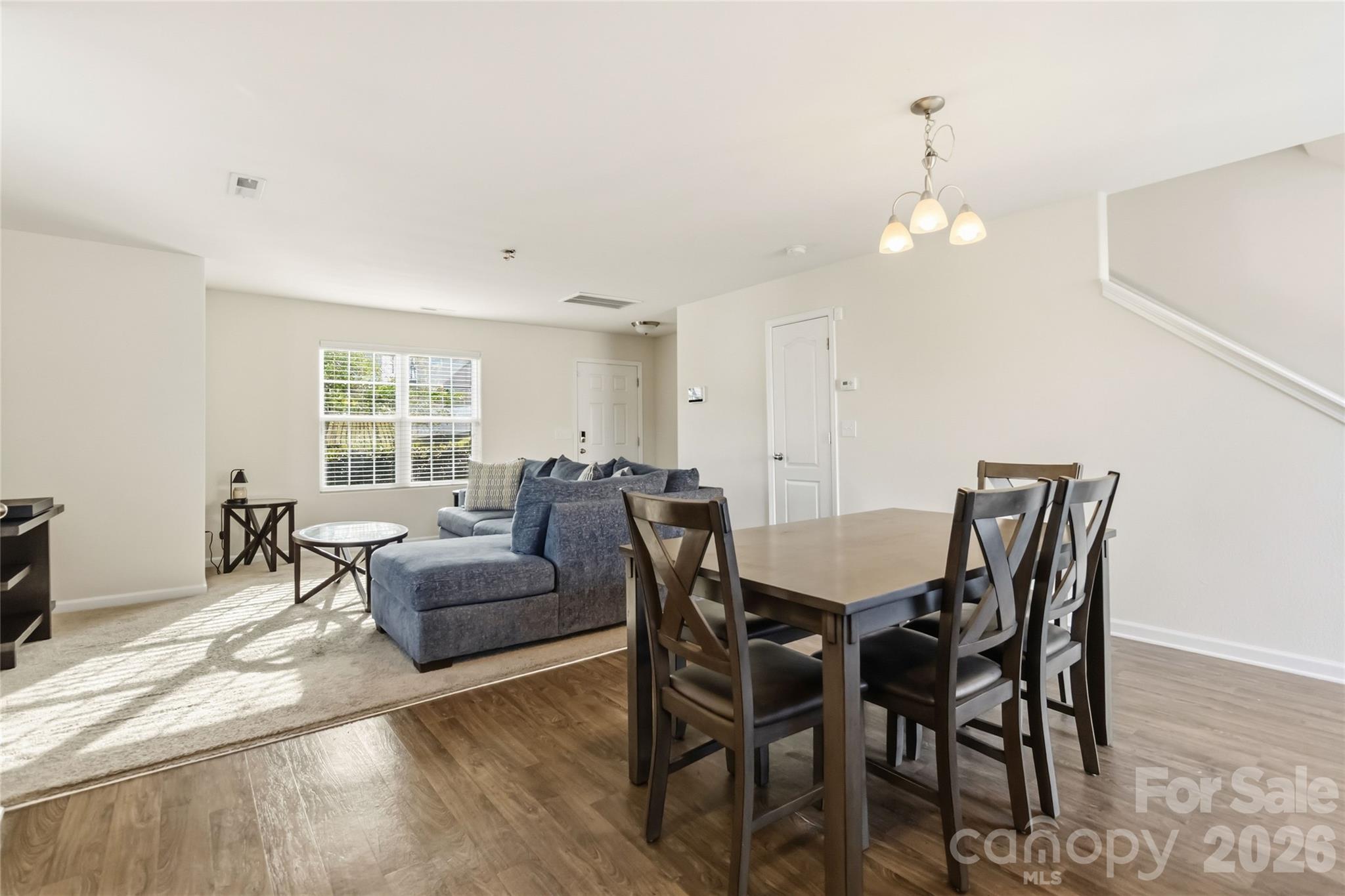 14015 Rory Glen Lane Charlotte, NC 28215 - Photo 14 of 28 a view of a dining room with furniture