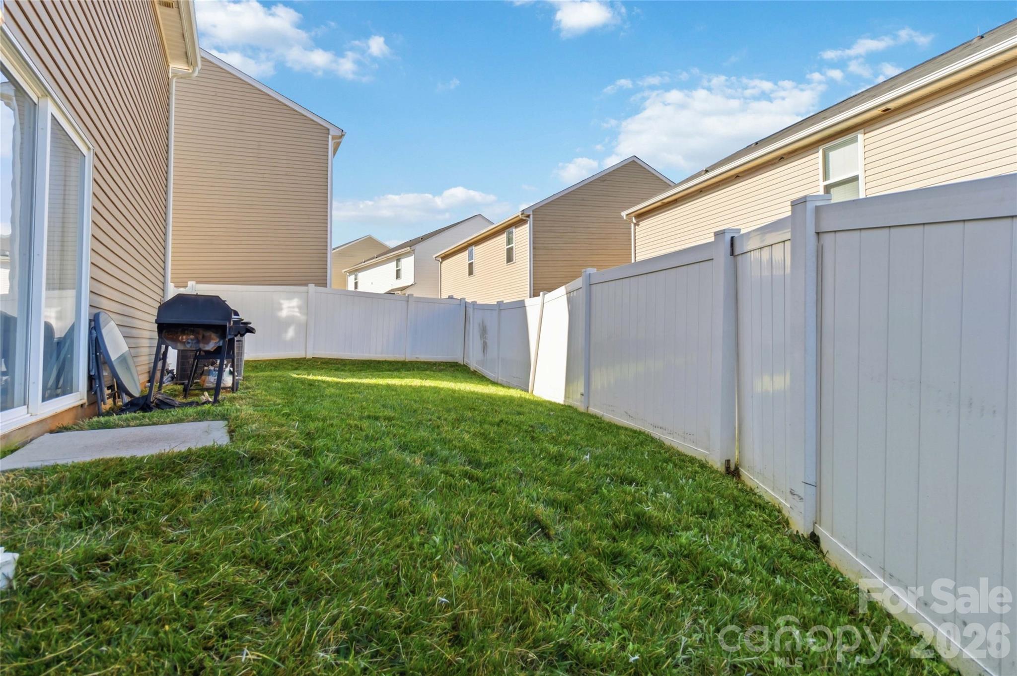 14015 Rory Glen Lane Charlotte, NC 28215 - Photo 27 of 28 a view of backyard with a garden and plants
