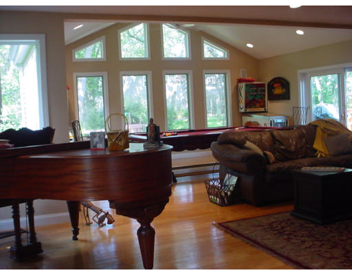 144 Tudor Road Needham, MA 02492 - Photo 1 of 5 a living room with furniture window and wooden floor
