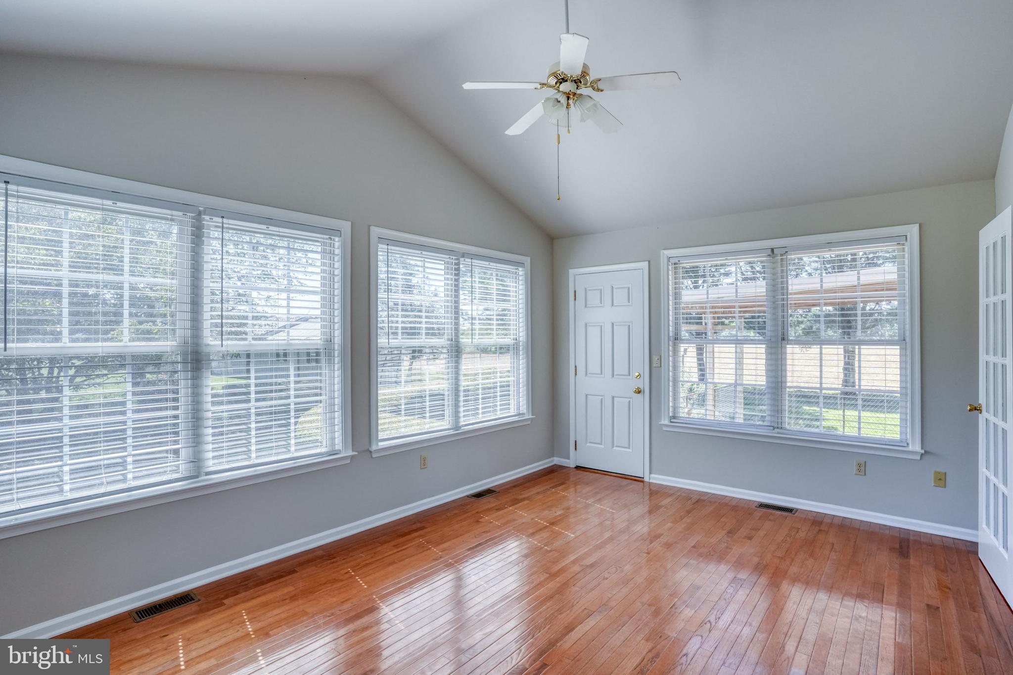 1663 White Marsh Branch Road Harrington, DE 19952 - Photo 32 of 40 Sunroom to door to patio