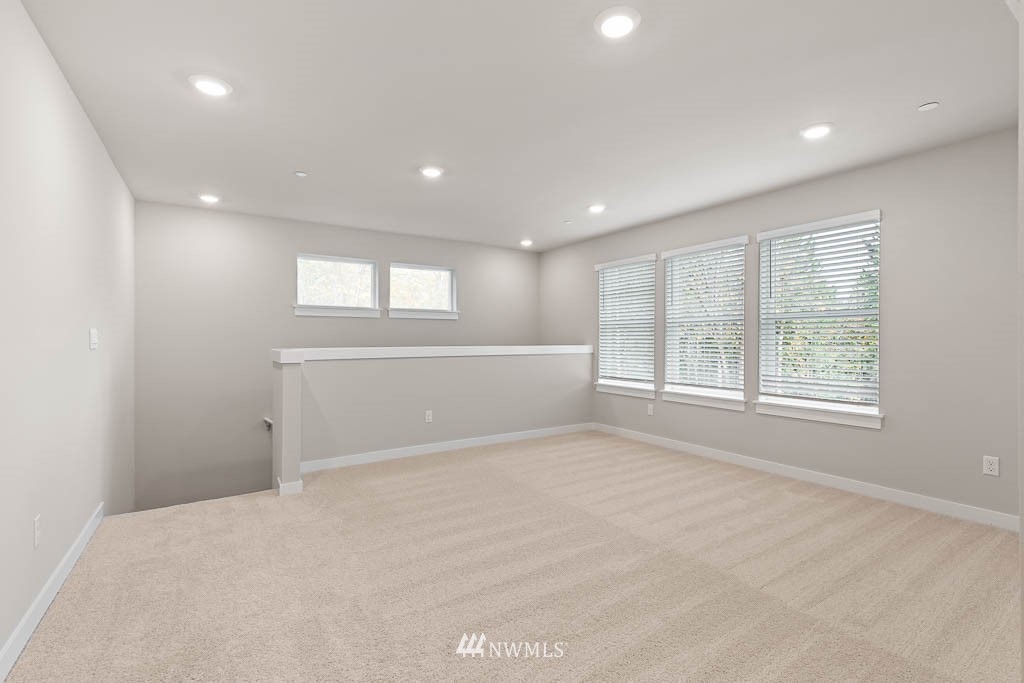 104 211th Street Southeast, Unit P18 Bothell, WA 98021 - Photo 17 of 31 a view of an empty room with a window